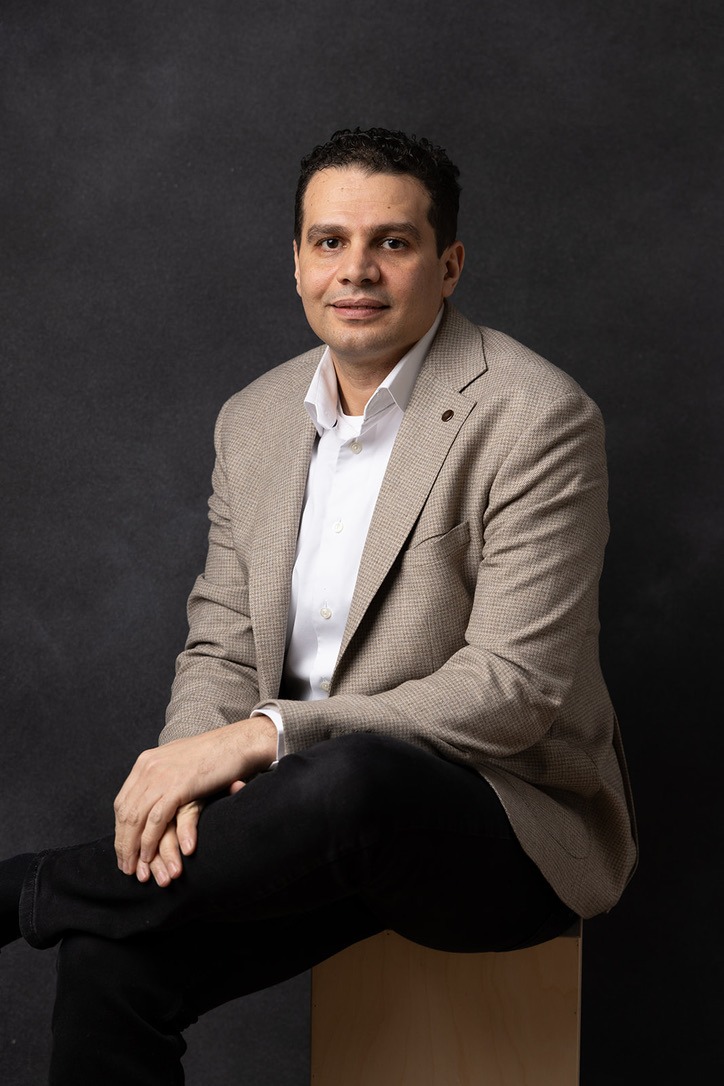 Mohamed Talaye, seated
